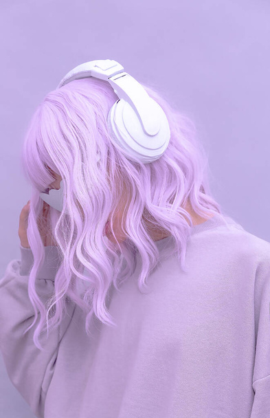 Vanilla Purple Dj Girl. Monochrome color trends. Stylish headphones, music lover concept - Fotó, kép