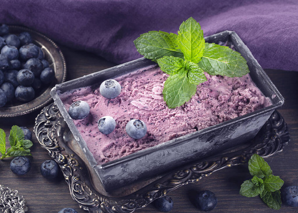 Homemade blueberry ice cream with fresh mint - Photo, image