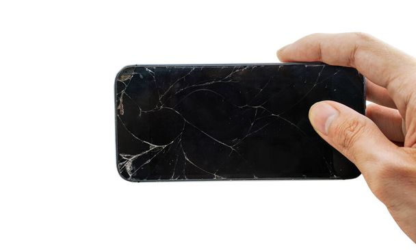 right hand hold Mobile smartphone with broken screen isolated on white background.with clipping path - Valokuva, kuva