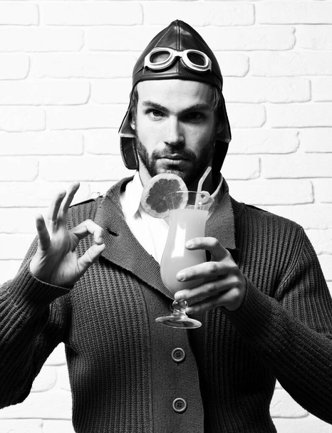 bearded pilot with cocktail in glass - Fotografie, Obrázek