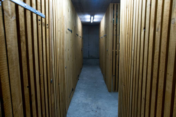 Inside of a bunker with a wooden interior and and with several corridors to protect from a bomb attack - Photo, Image