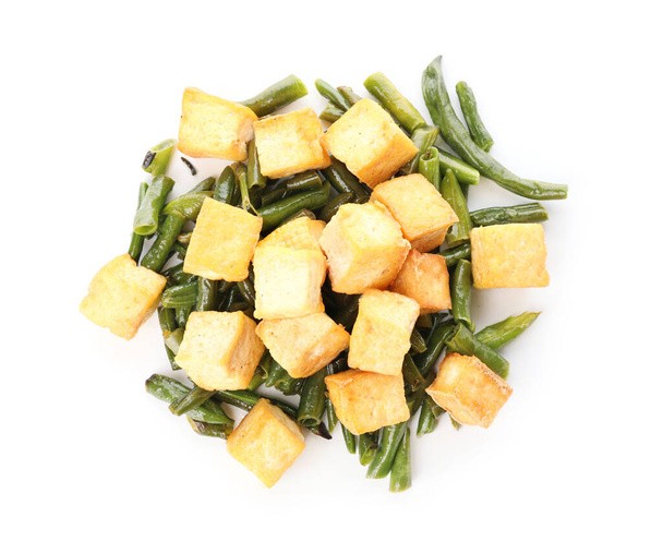 Tasty tofu cheese and vegetables on white background - Photo, Image