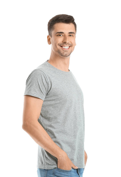 Man in stylish t-shirt on white background - Photo, Image
