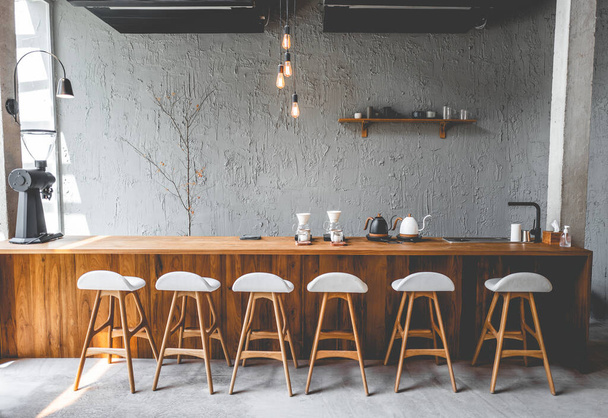 Layout in a loft style in dark colors open space interior view of various coffee Welcome open coffee shop background - 写真・画像