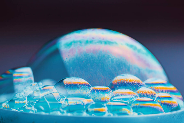 Beautiful translucent soap bubble on dark background - Photo, Image