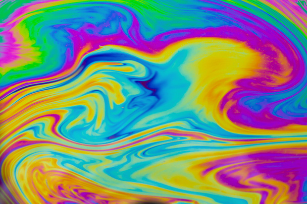 Психоделический многоцветный фон. Фотографический макроснимок мыльных пузырей - Фото, изображение