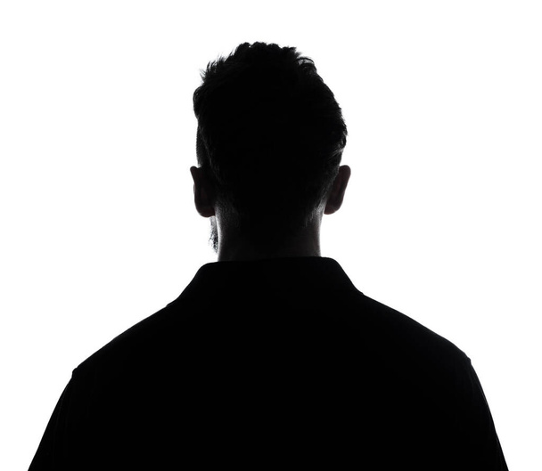 Silhouette férfi személy, hátsó nézet megvilágított felett fehér  - Fotó, kép