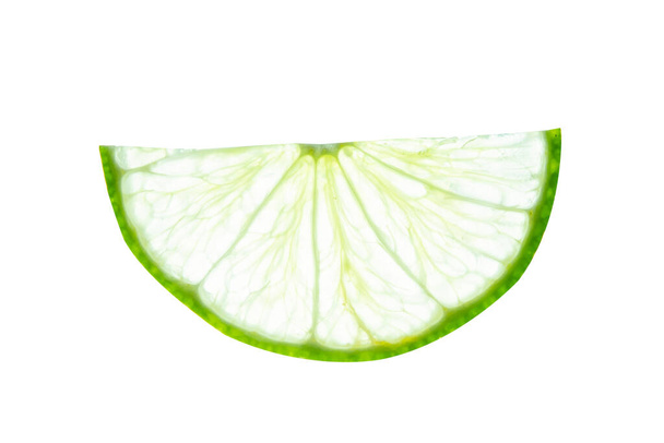 Lime slice top view. Fruit isolated on white background. With clipping path. - Photo, Image
