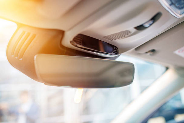 Car Rear view mirror, soft focus. White interior of a new modern car. - Photo, Image
