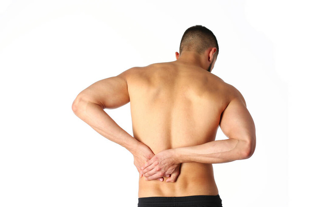 Young man holding his neck in pain. Medical concept - Foto, afbeelding