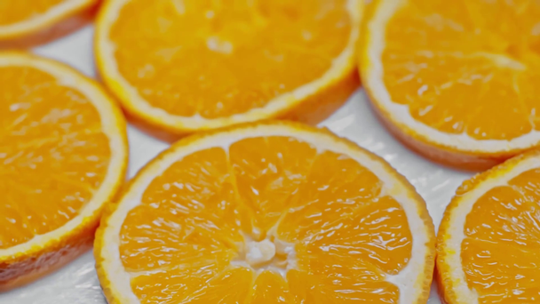 close up view of fresh orange slices - Кадры, видео