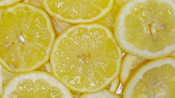 top view of fresh ripe lemon slices - Footage, Video