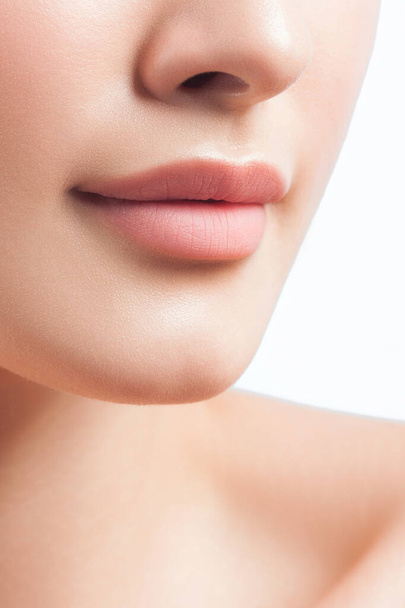 Anonymous portrait of young beautiful girl. Lips close up. Beauty and skin care concept - 写真・画像