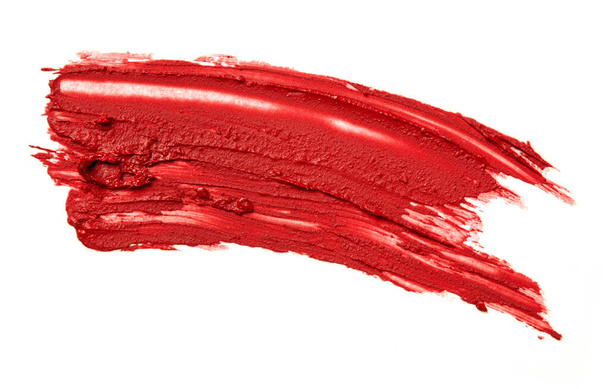 Roter Lippenstift isoliert auf Weiß geschmiert - Foto, Bild