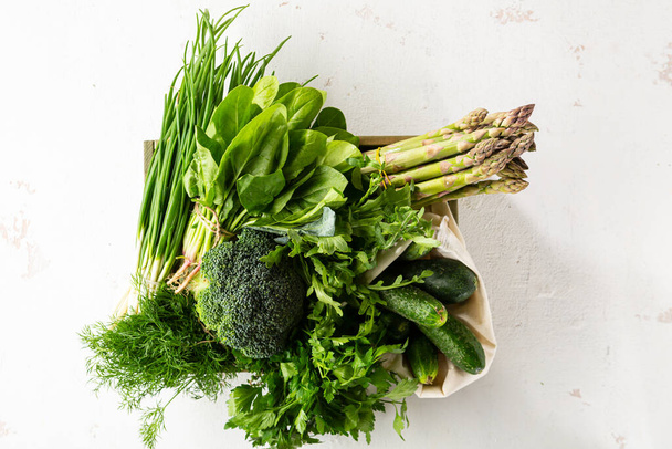 Top view of fresh green vegetables, ingredients - Фото, изображение