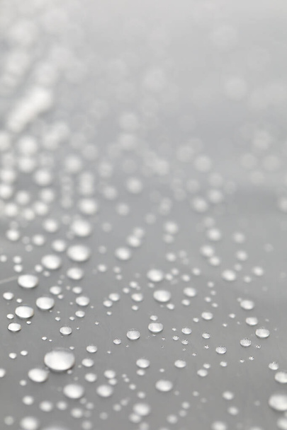 Background design made of water drops on a gray background - Foto, Imagen