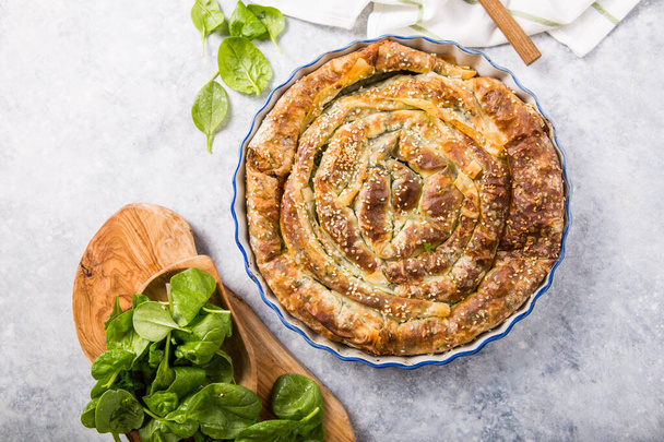 Fresh baked greek spanakopita with spinach, feta cheese and a flaky crust - Photo, Image