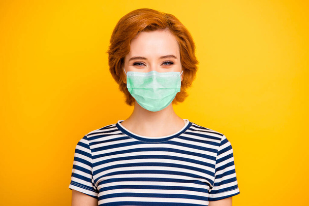 Closeup photo beautiful amazing lady kindhearted easy-going overjoyed wearing casual striped white blue t-shirt protection facial mask isolated yellow bright vibrant vivid background - Φωτογραφία, εικόνα
