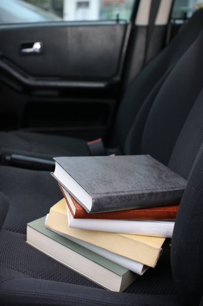 Books on the car seat - Photo, image