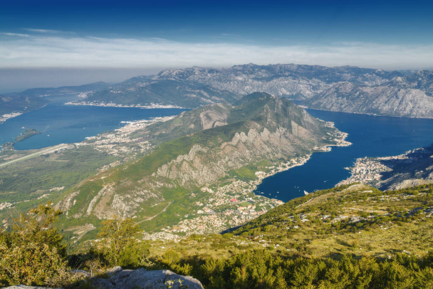 Sunrise panoramic morning view of mountain randge and Kotor bay, Montenegro. View from the top of the mountain serpentine. - Photo, Image