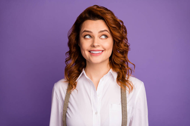 Closeup photo of pretty funny curly foxy lady cheerful person good mood casino dealer look interested side empty space wear white shirt suspenders isolated purple color background - Fotoğraf, Görsel