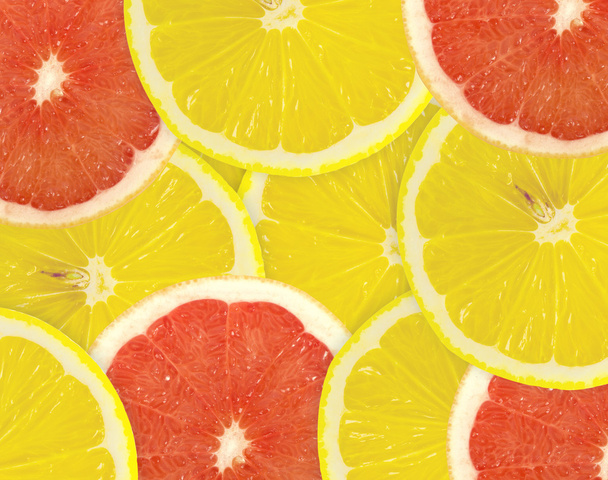 Abstract background of citrus slices. - Foto, Bild