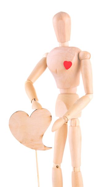 Wooden mannequin with heart isolated on white - Foto, imagen