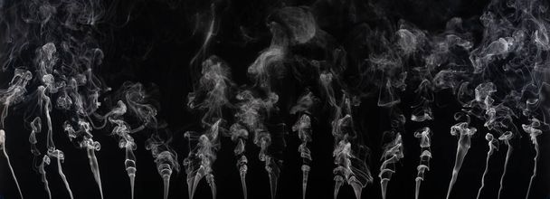 Abstract smoke on a dark background . Isolated . - Photo, Image