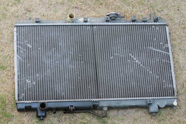 Old car radiators, cooling radiators, engine blur on the grass - Photo, Image