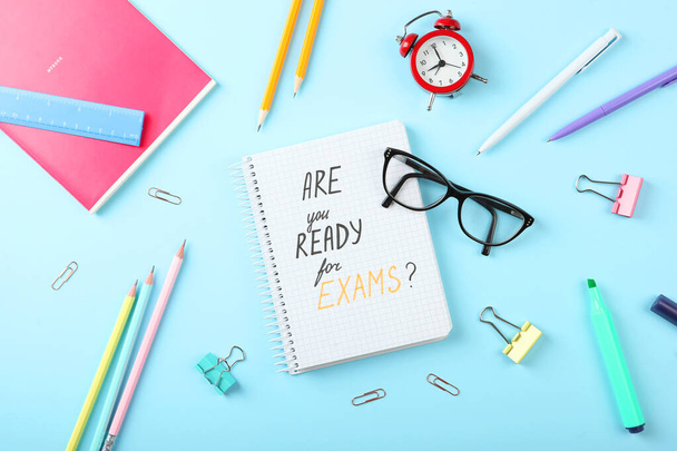 Composition on the theme "are you ready for exams" on a colored background top view - Φωτογραφία, εικόνα
