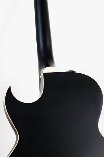 ブラックエレキロックギター滑らかな形状シルエット - 写真・画像