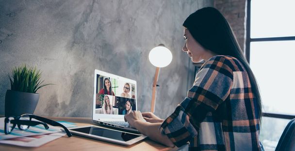Using modern digital technology corona virus covid-19 concept. Profile side photo of smart pretty lady typing message speaking talking having communication with several girlfriends via videocall - Fotoğraf, Görsel