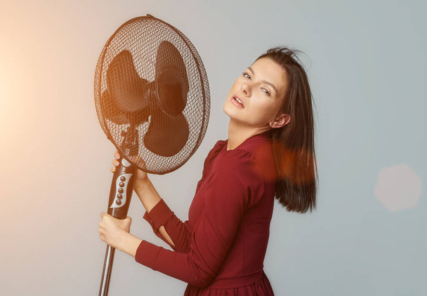 girl posing with a fan - Photo, Image