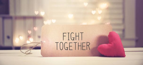 Fight Together message with a red heart - Photo, image