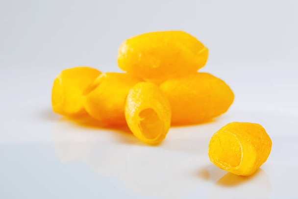 yellow cocoon for face cleaning isolated. - Photo, Image