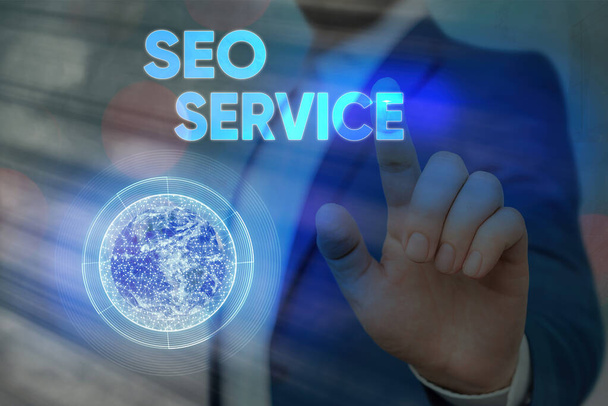 Conceptual hand writing showing Seo Service. Business photo text techniques and procedures to increase the website visibility Elements of this image furnished by NASA. - Photo, Image