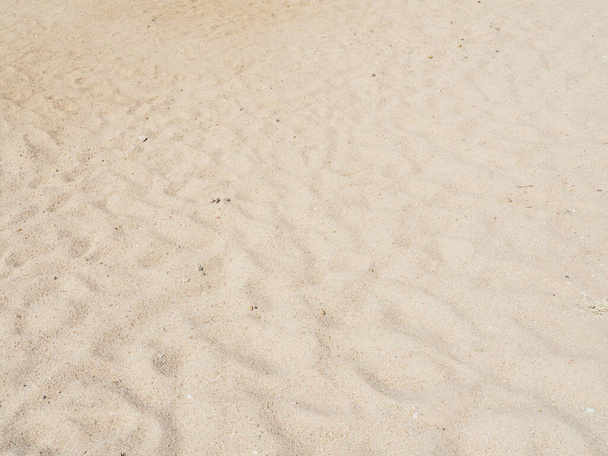Close up view on yellow sand texture, close up view. Abstract pattern on yellow sand, background. Egyptian beach in february. Selective soft focus. Blurred background. - Foto, immagini