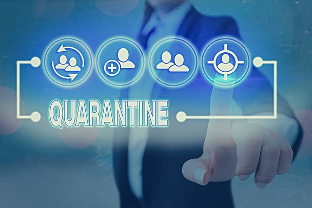 Conceptual hand writing showing Quarantine. Business photo showcasing restraint upon the activities of an individual or the transport of goods. - Photo, Image