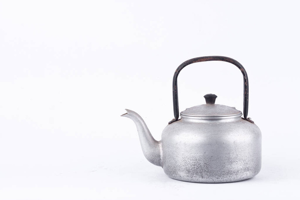 old vintage retro Kettle on white background drink isolated ( still life). Which, kettle made of aluminum materials. - Photo, Image