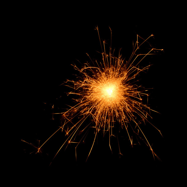 Burning sparklers isolated on black background. - Photo, image