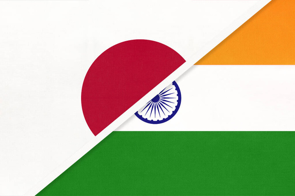 Japan and India, symbol of two national flags from textile. Relationship, partnership and championship between Asian countries. - Фото, изображение