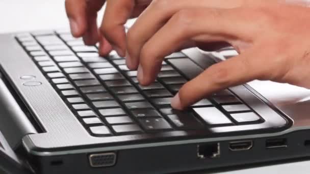 Hand key typing on black laptop - Footage, Video