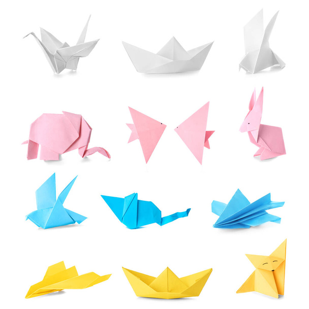 Многие фигуры оригами на белом фоне
 - Фото, изображение