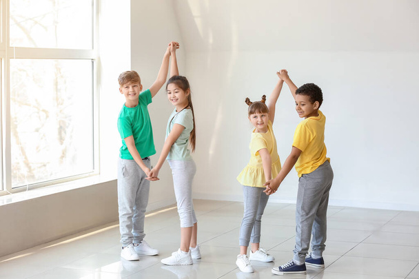 Cute little children dancing in studio - Photo, Image