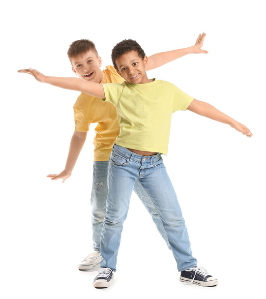 Cute dancing children on white background - Фото, изображение