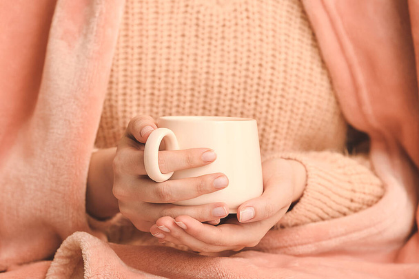 Woman with cup of tea, closeup - Photo, image