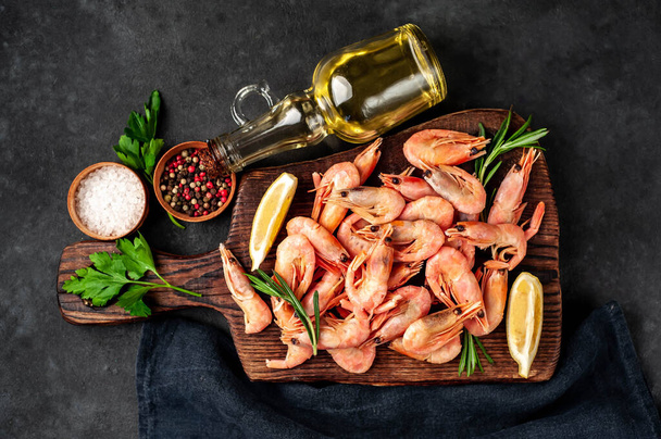 uncooked fresh shrimps, sea food on wooden board - Photo, Image