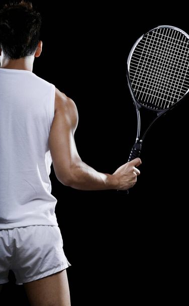 Man with a tennis racquet - Foto, afbeelding
