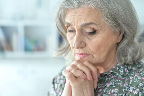 Close up portrait of sad senior woman  - Фото, зображення