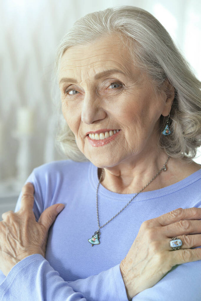 beautiful senior woman smiling  at home  - Photo, image